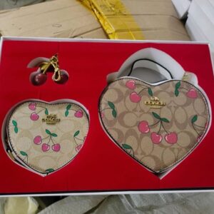 Bandolera coach set incluye su llavero de cereza